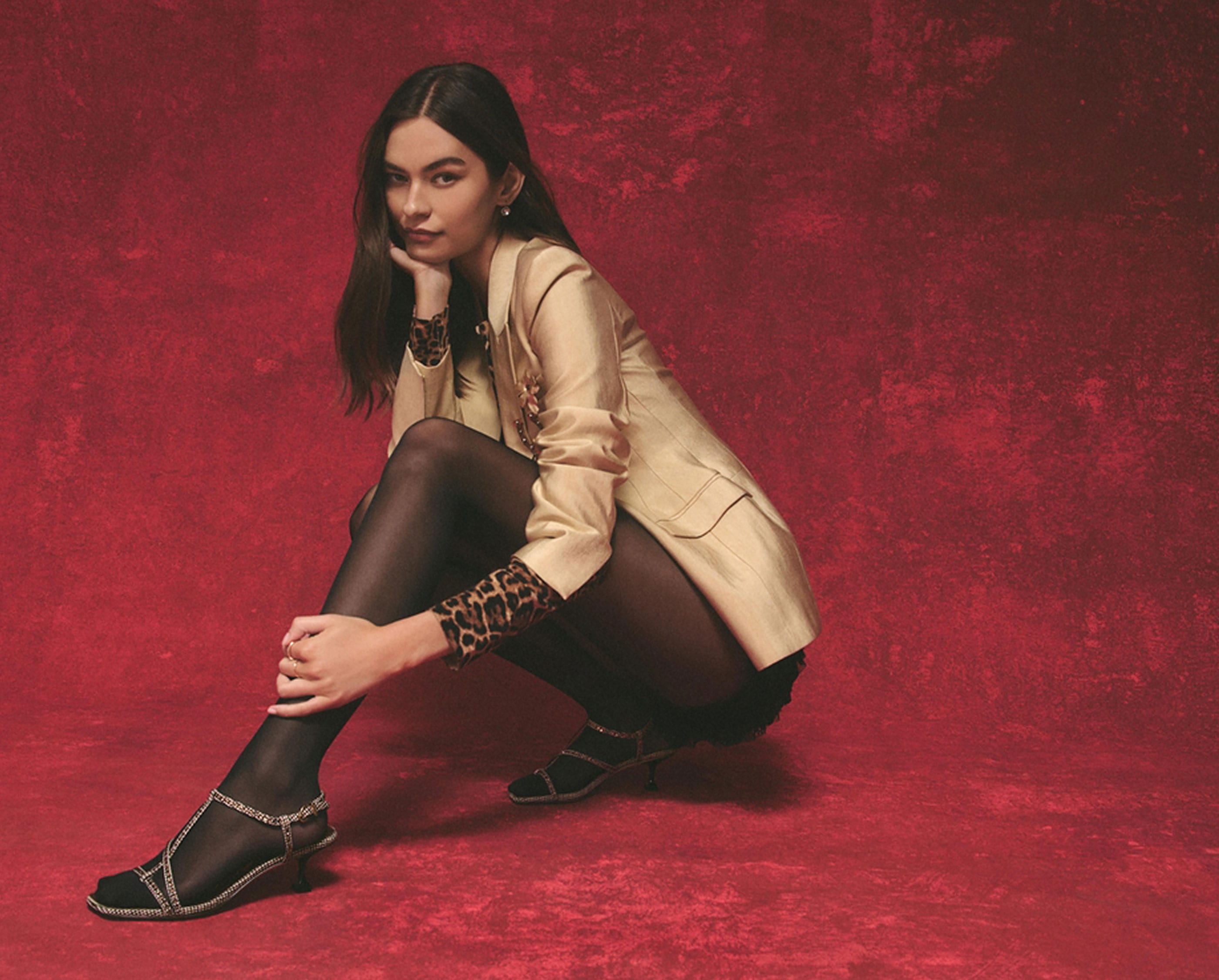 woman wearing the jaida kitten heel sandal with tights